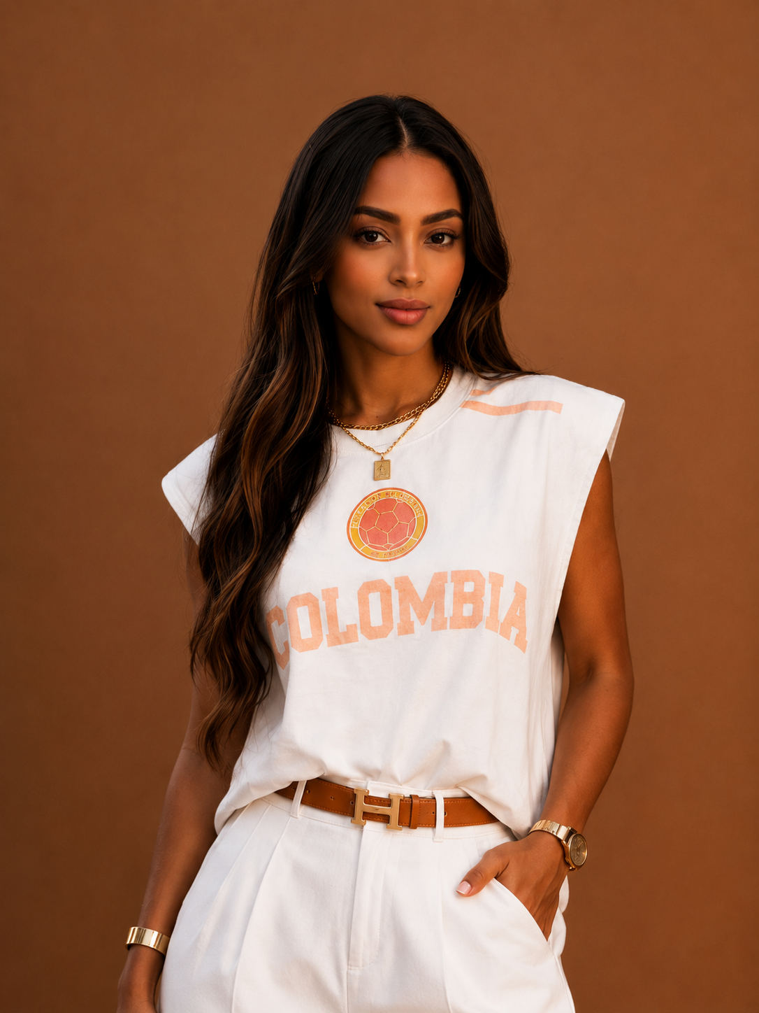 It Girl Colombia Sport oversize tee close-up styled with white trousers — May Palomino